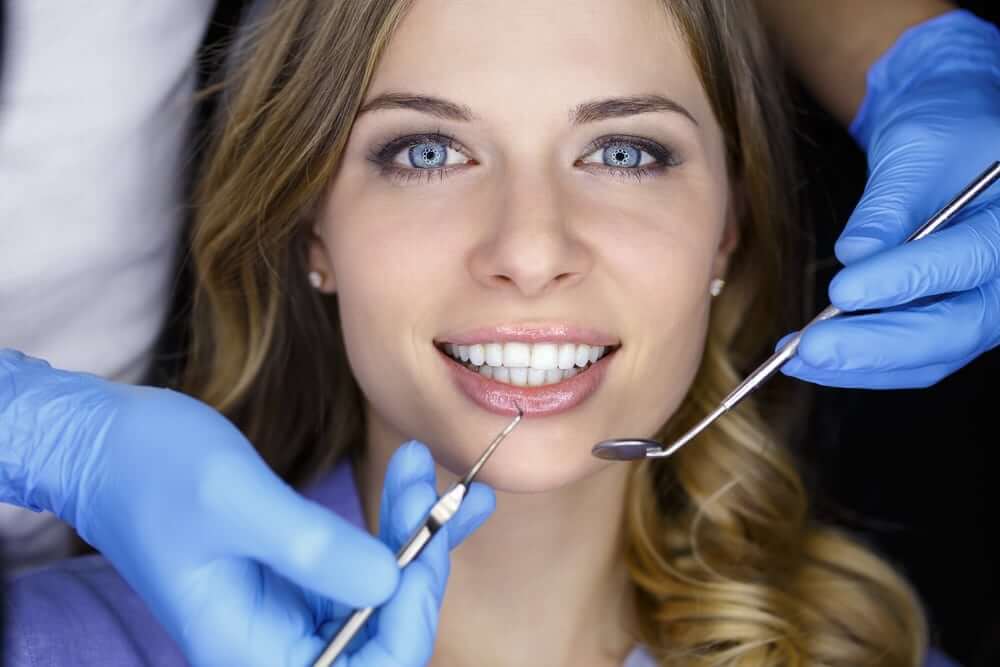 Image of female patient dentist regular checkup