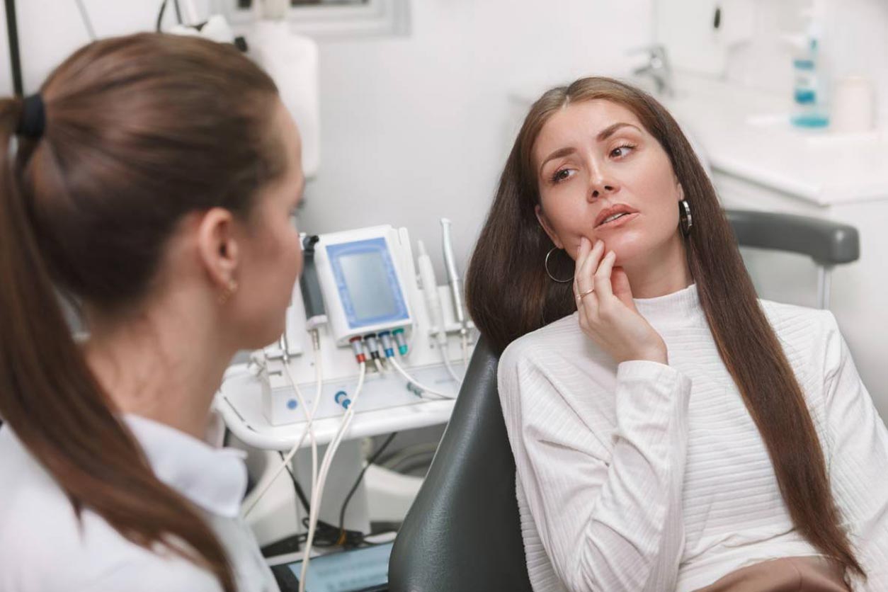 woman wondering if dental crowns get cavities