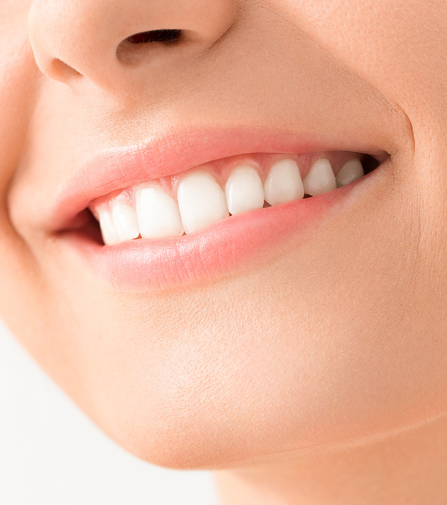 Stock image of a smiling woman with white teeth